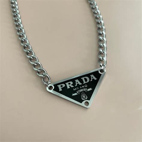 prada logo charm|Prada necklace for women.